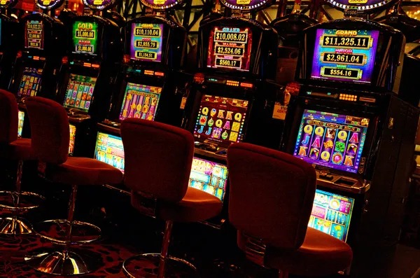 Live card dealer at professional warung4d studio dealing blackjack with multiple camera angles visible